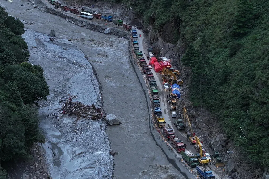 China reopens Tibet road as rescue teams search for disaster survivors
