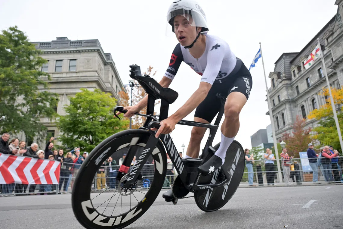 Reusser retains world time trial crown on 35th birthday