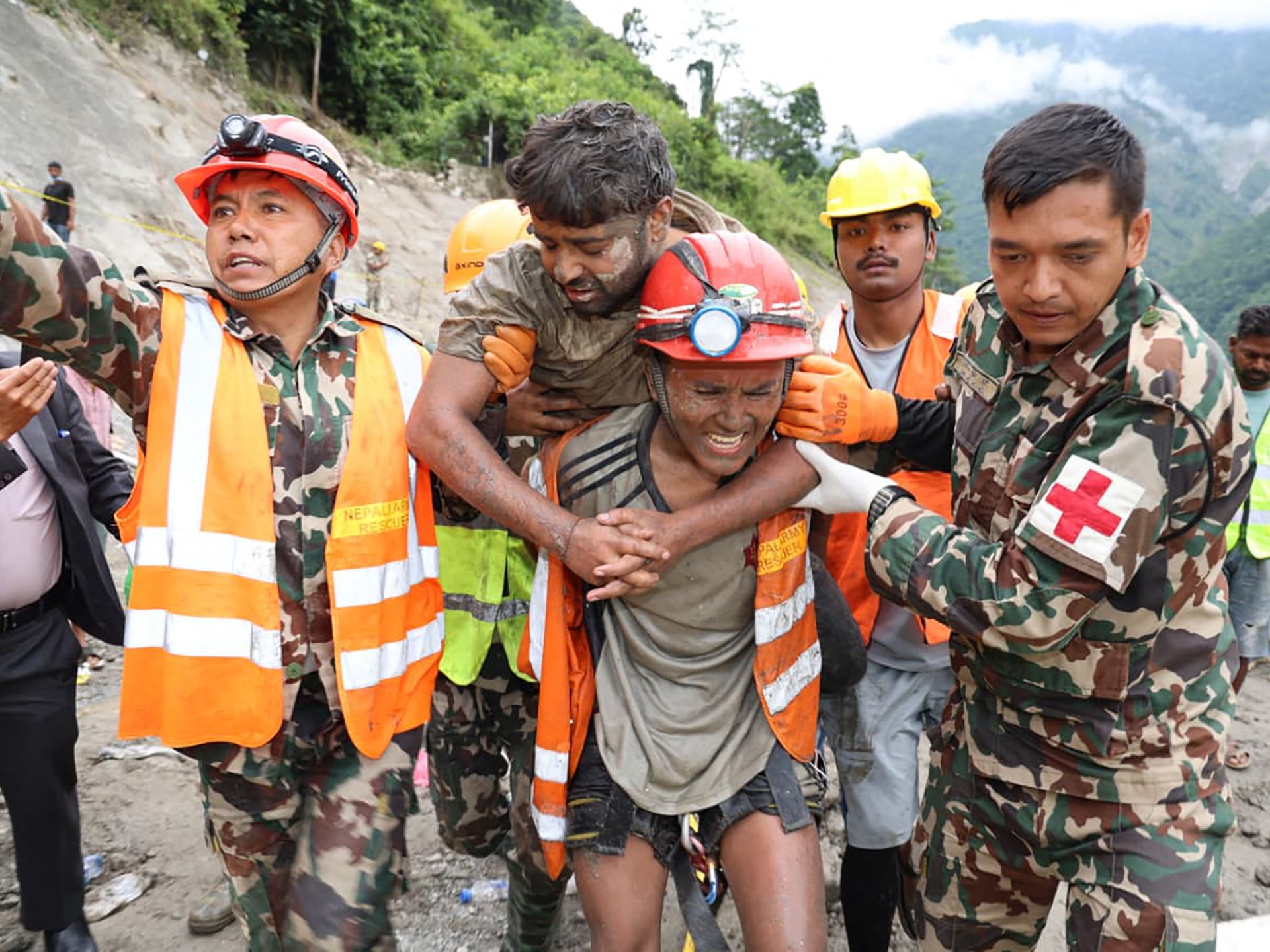 Nepal rescue teams find two workers alive in hydropower tunnel after nine days