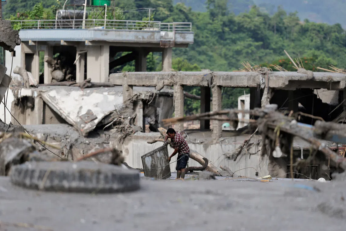 Nepal, China warn of fresh flood threats from swelling lakes