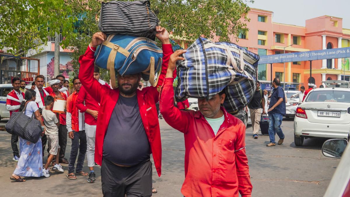 Railway modernisation leaves platform porters struggling with vanishing livelihoods