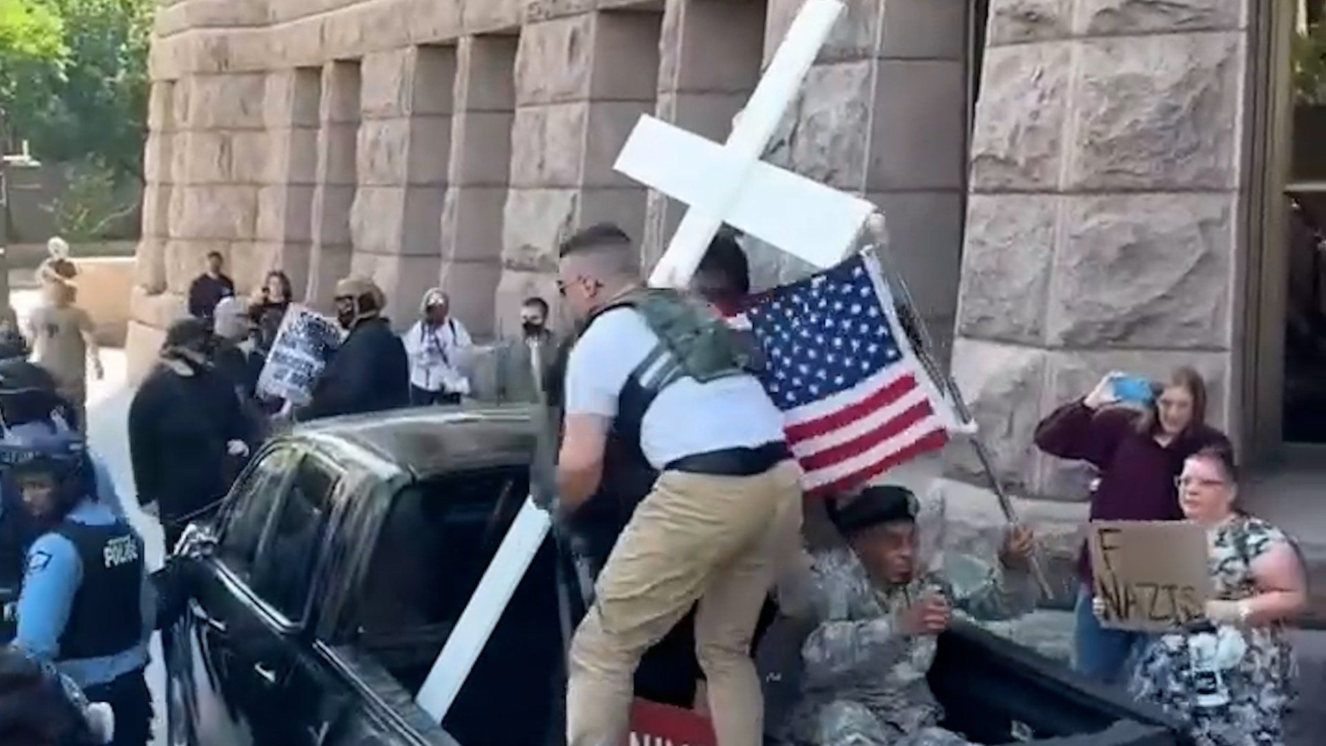 Far-right activist arrested as rally near Minneapolis descends into violence