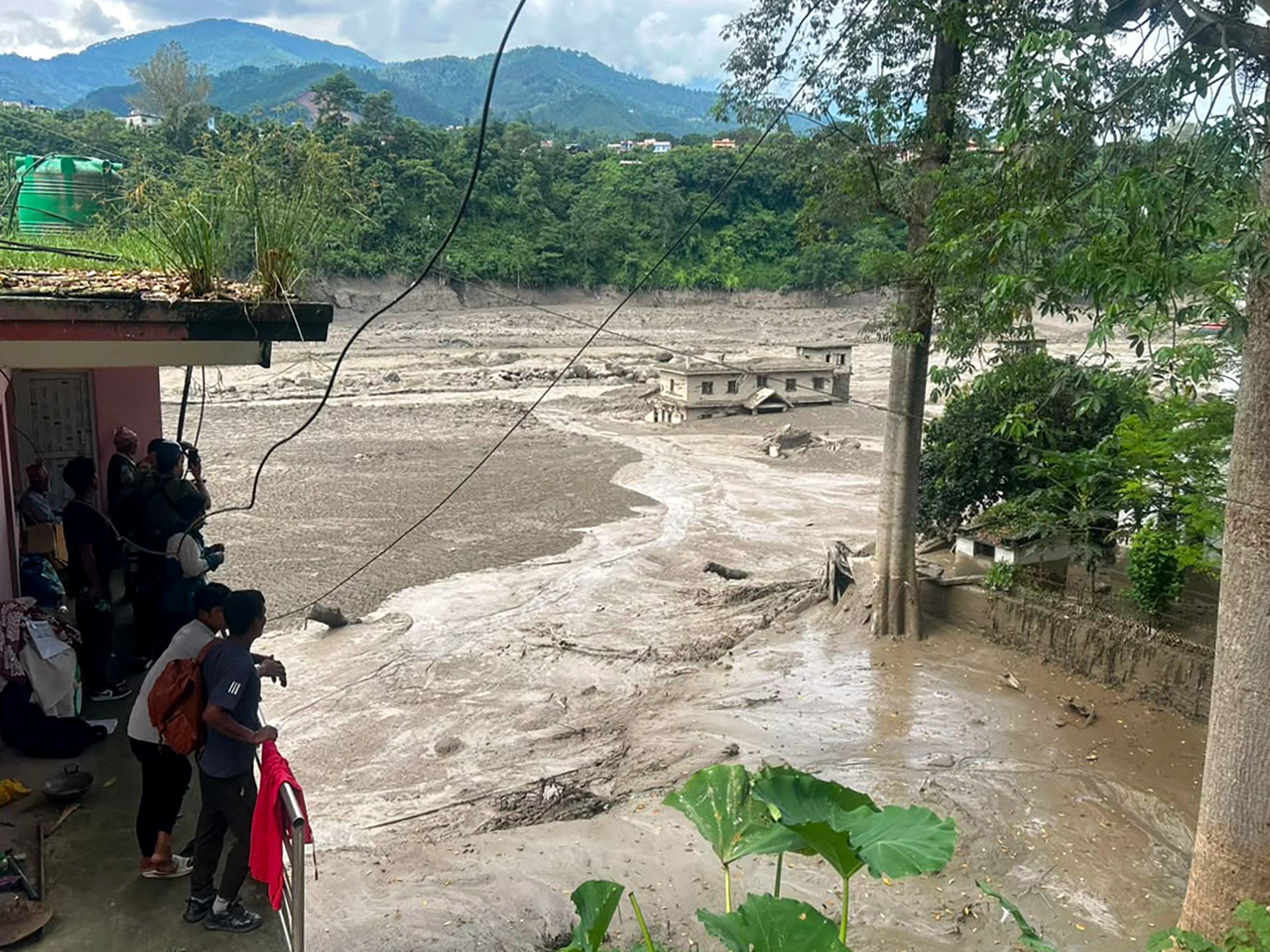 Nepal flash floods kill at least eight, damage critical infrastructure