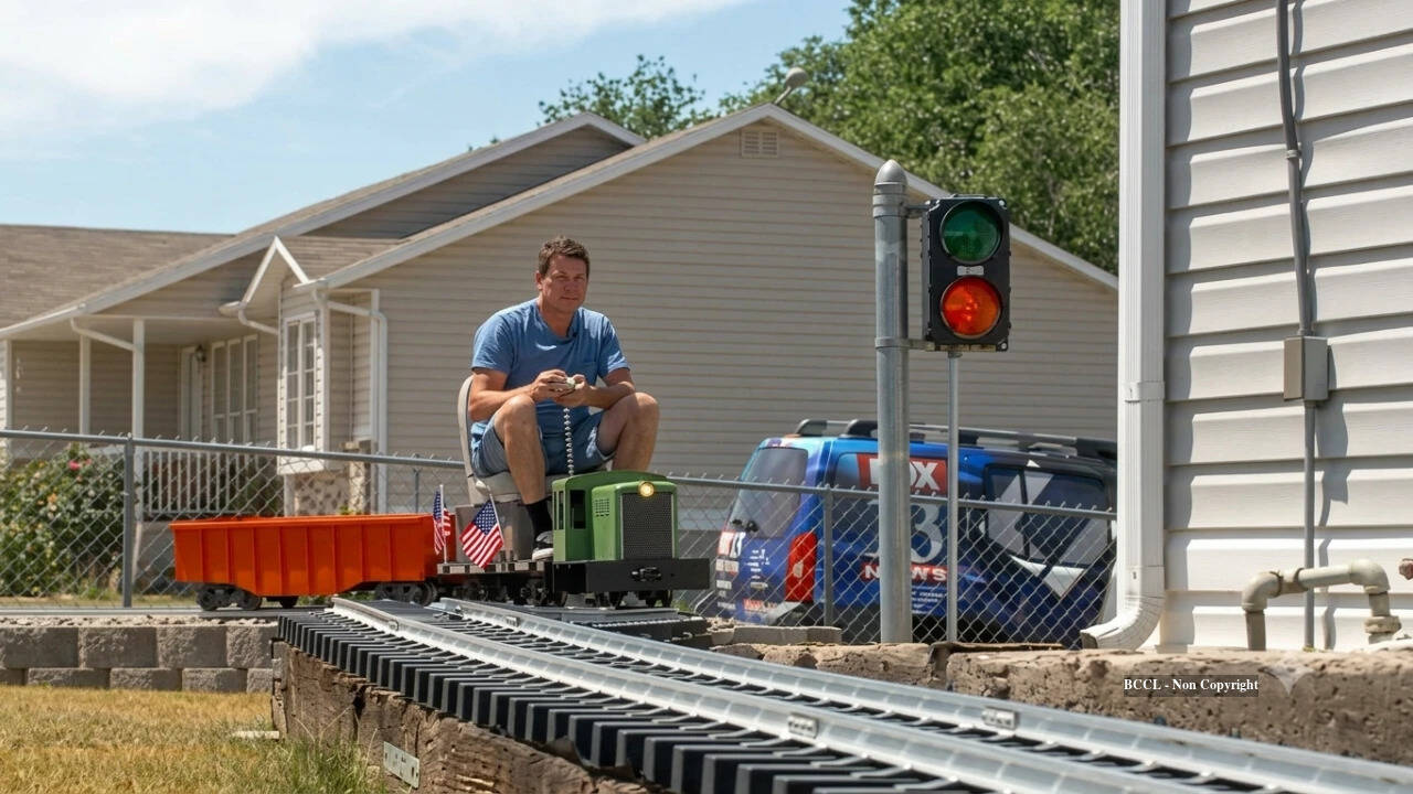 American enthusiast builds backyard miniature railway to delight neighbourhood children