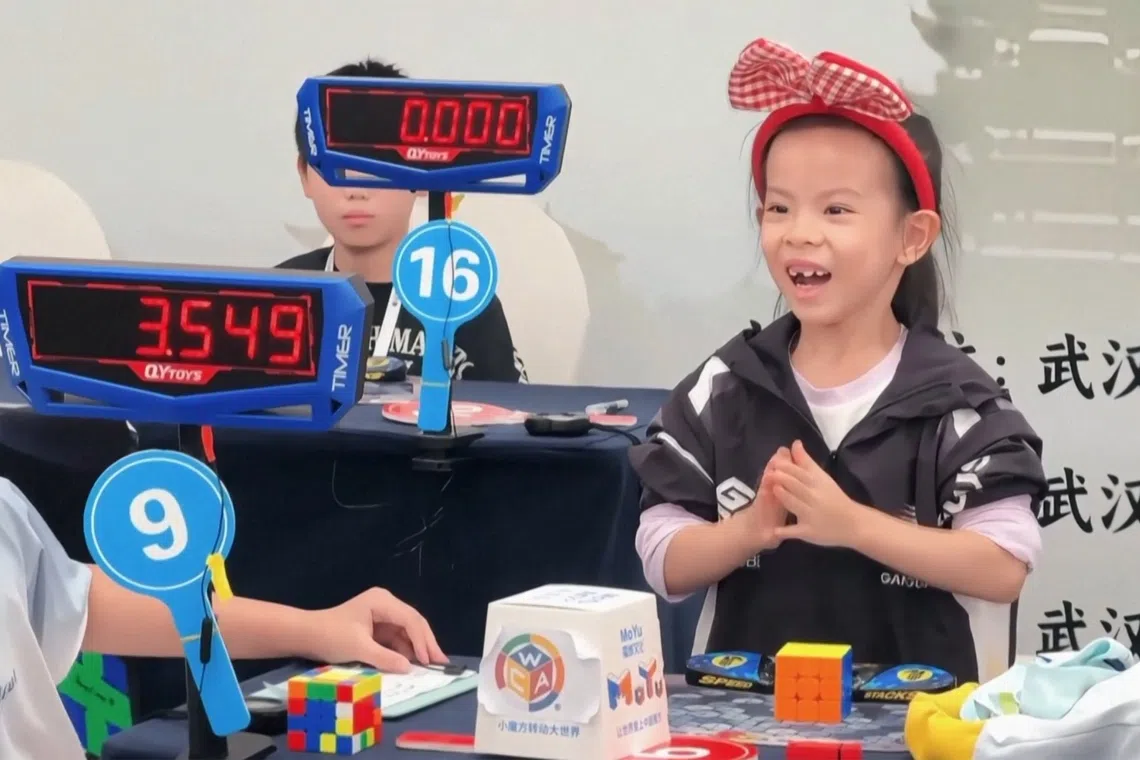 Chinese girl, 6, shatters Rubik's Cube speed record