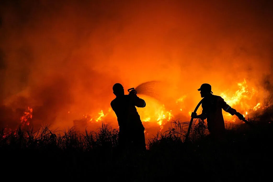 Indonesia intensifies firefighting efforts as regional haze worsens
