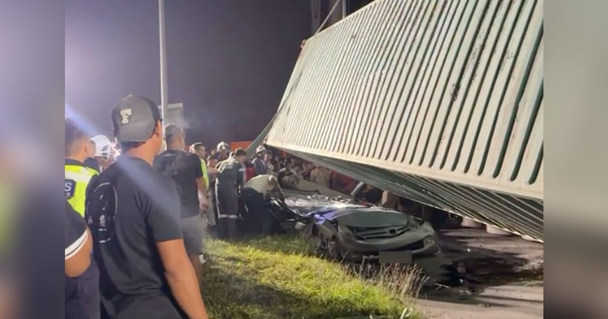 Father and daughter killed after vehicle crushed by overturned container in Sabah