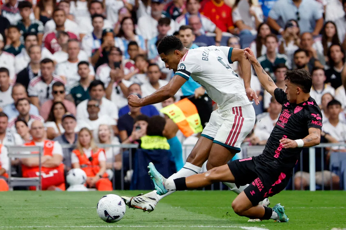 Real Madrid maintains unbeaten start with dominant Malaga rout