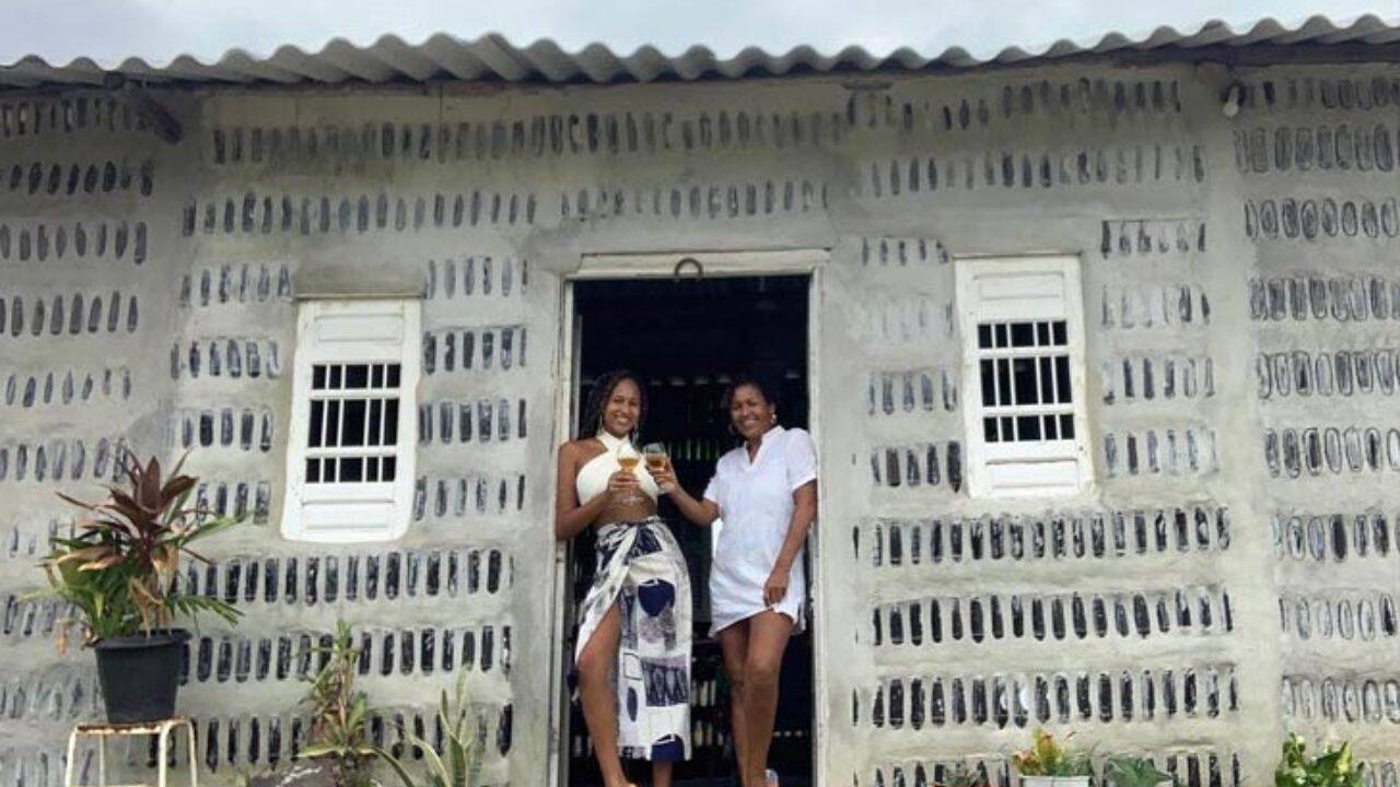 Brazilian duo builds sustainable home from 8,000 recycled glass bottles