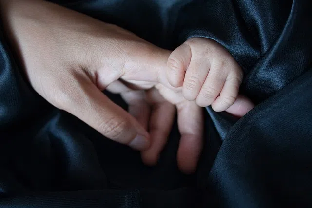 Singapore extends child support benefits to children of unmarried mothers