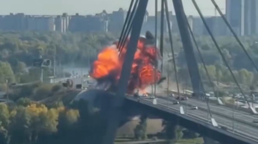 Russia strikes Kyiv bridge with heavy drone as German chancellor visits