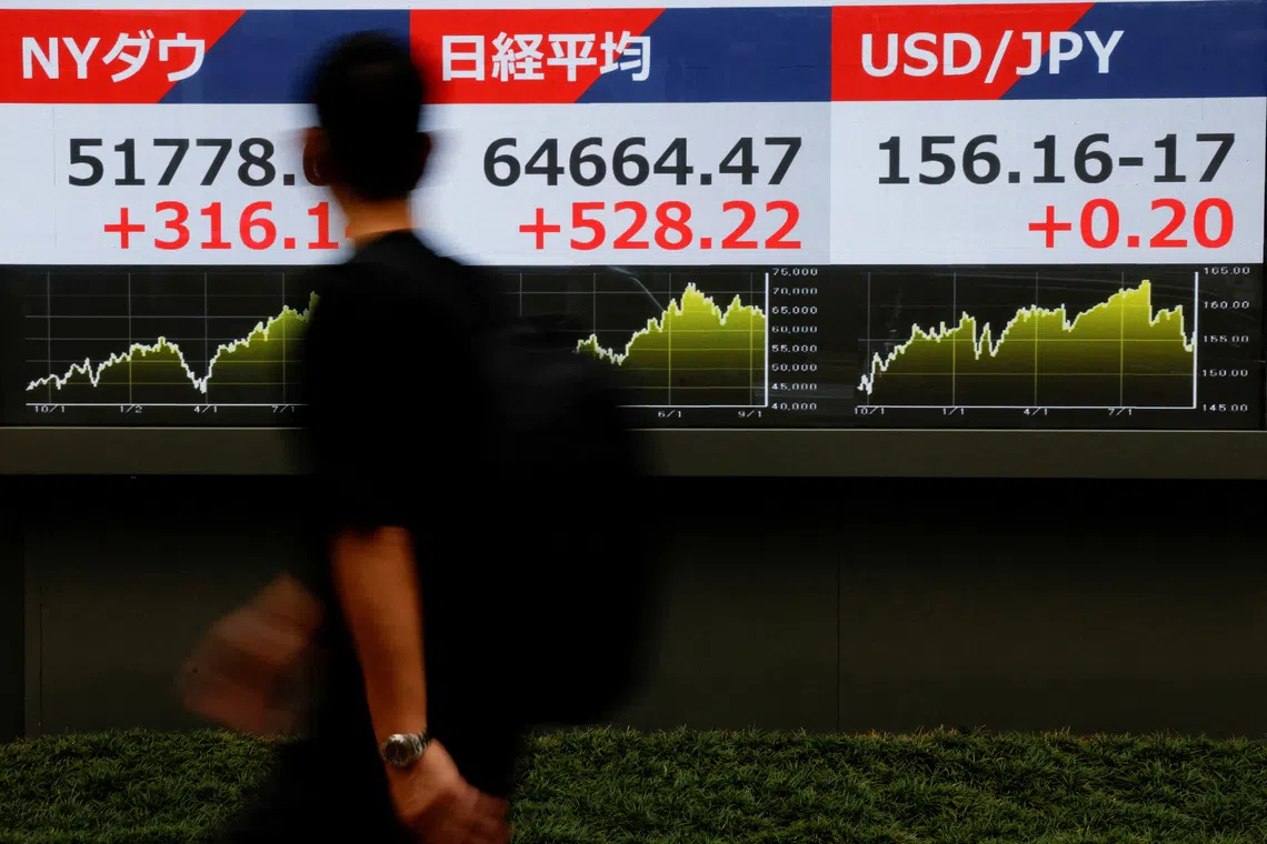Asian equities follow Wall Street gains amid yield pressures