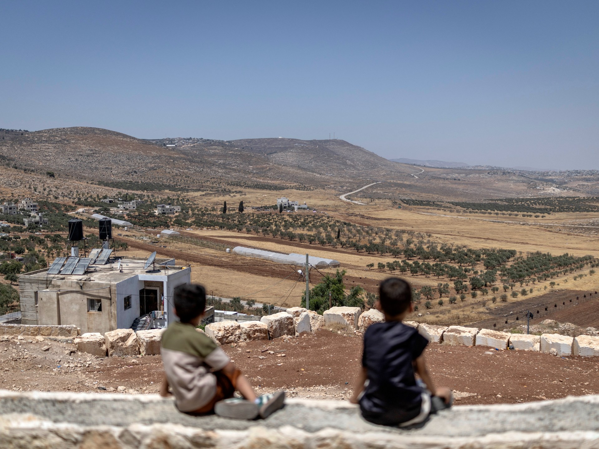 Two Palestinians killed in West Bank settler raid
