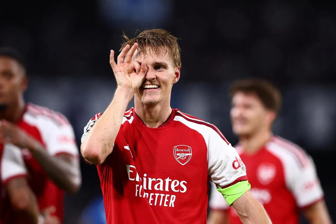 Arsenal, Liverpool advance in Champions League; PSG, Barcelona begin strongly