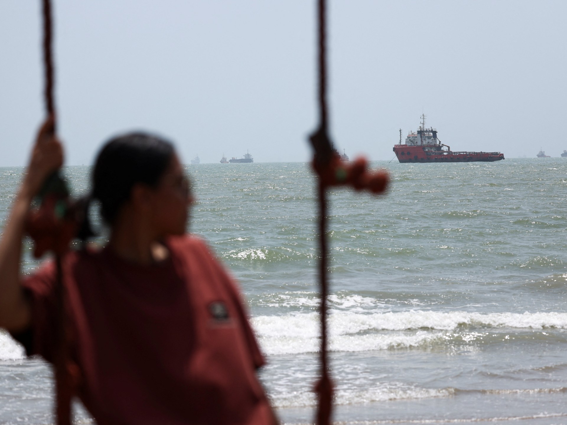 Iran insists Strait of Hormuz remains closed despite Oman route accord