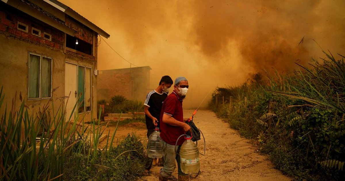 Indonesian airport suspends flights as haze blankets Sumatra region
