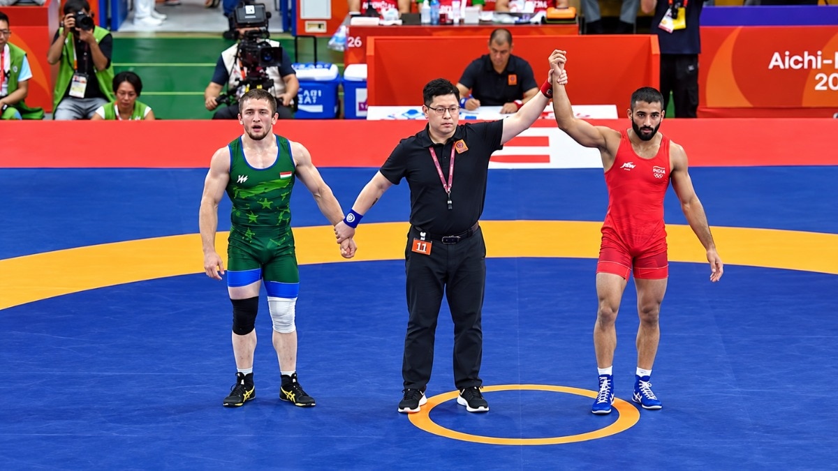 Sujit Kalkal stages dramatic comeback to claim Asian Games wrestling gold