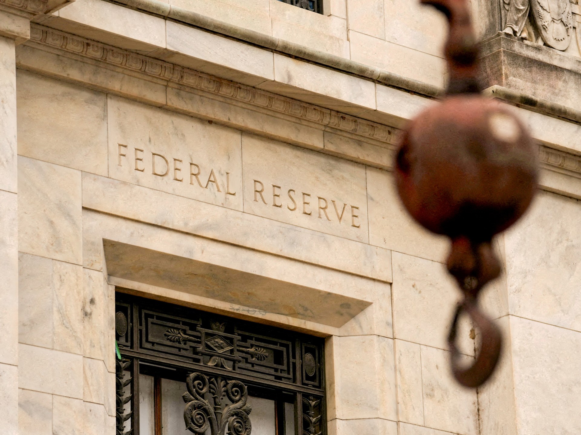 US Federal Reserve holds rates steady as inflation persists