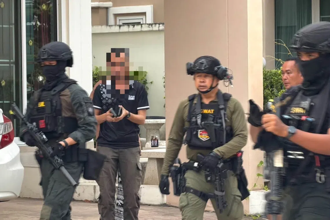 Thai policeman surrenders after 18-hour standoff following wife's death
