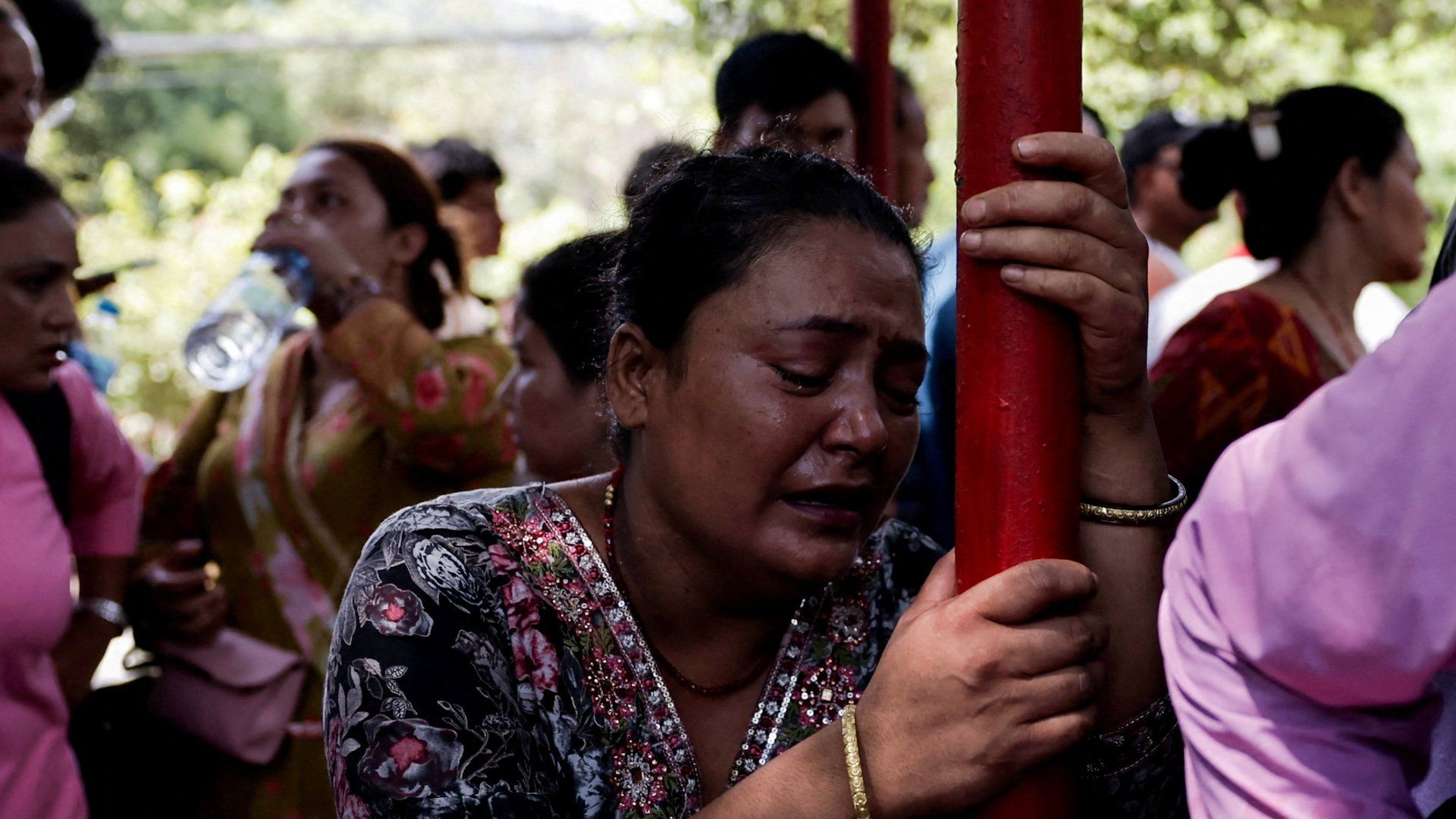 Nepal rescue teams pull survivors from rubble as families search for missing