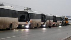 Residents evacuate Russian-held city after humanitarian crisis and ceasefire