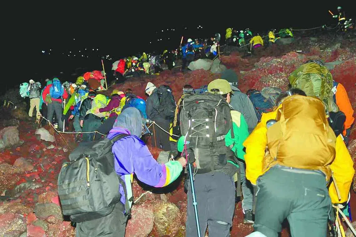 Japan's Mount Fuji still grapples with dangerous summit crowding