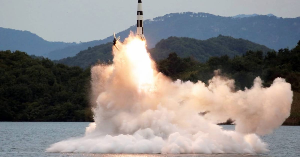North Korea launches projectile as Trump summit plans emerge