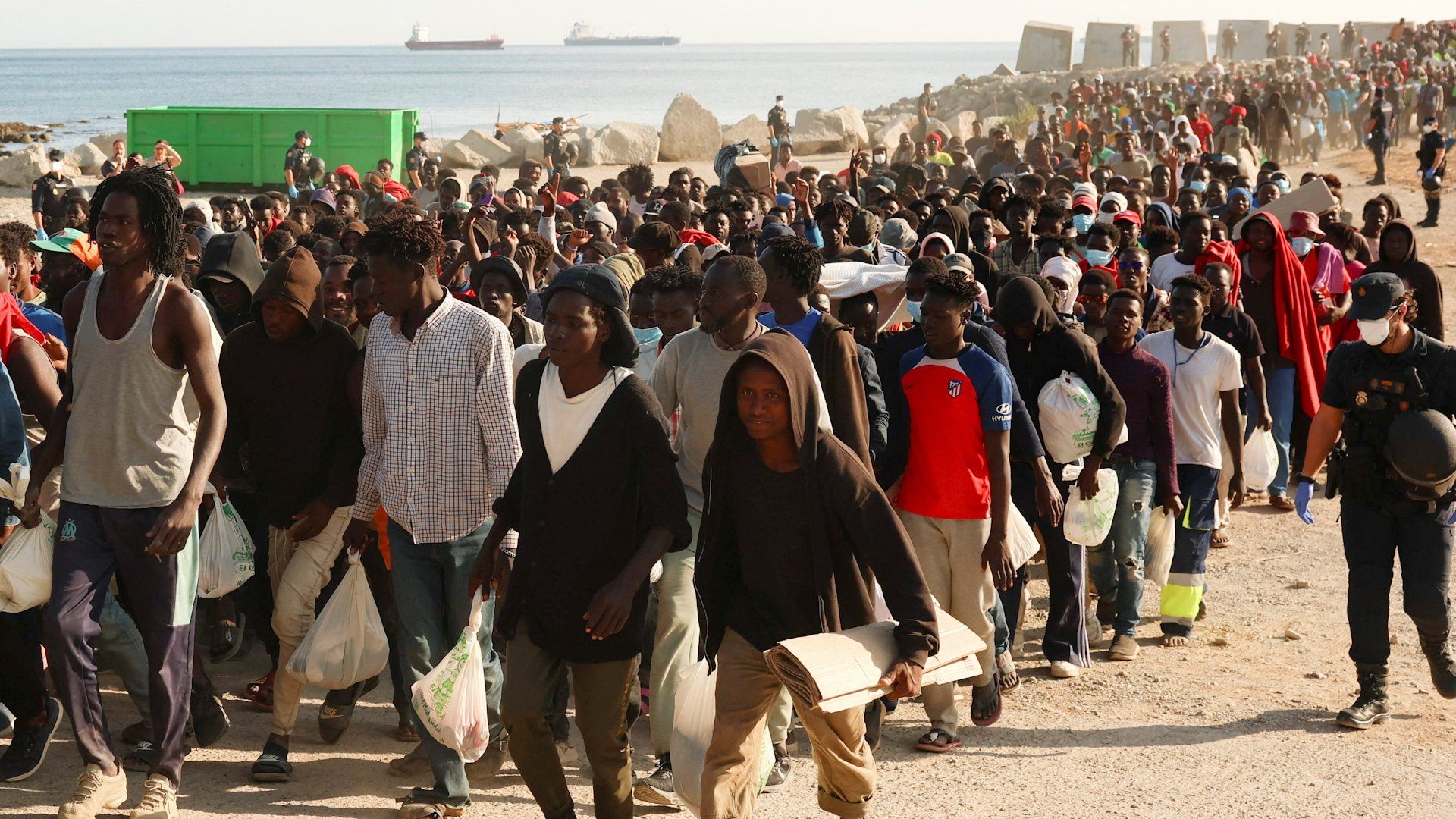 Spanish authorities relocate hundreds of migrants from Ceuta beach camps