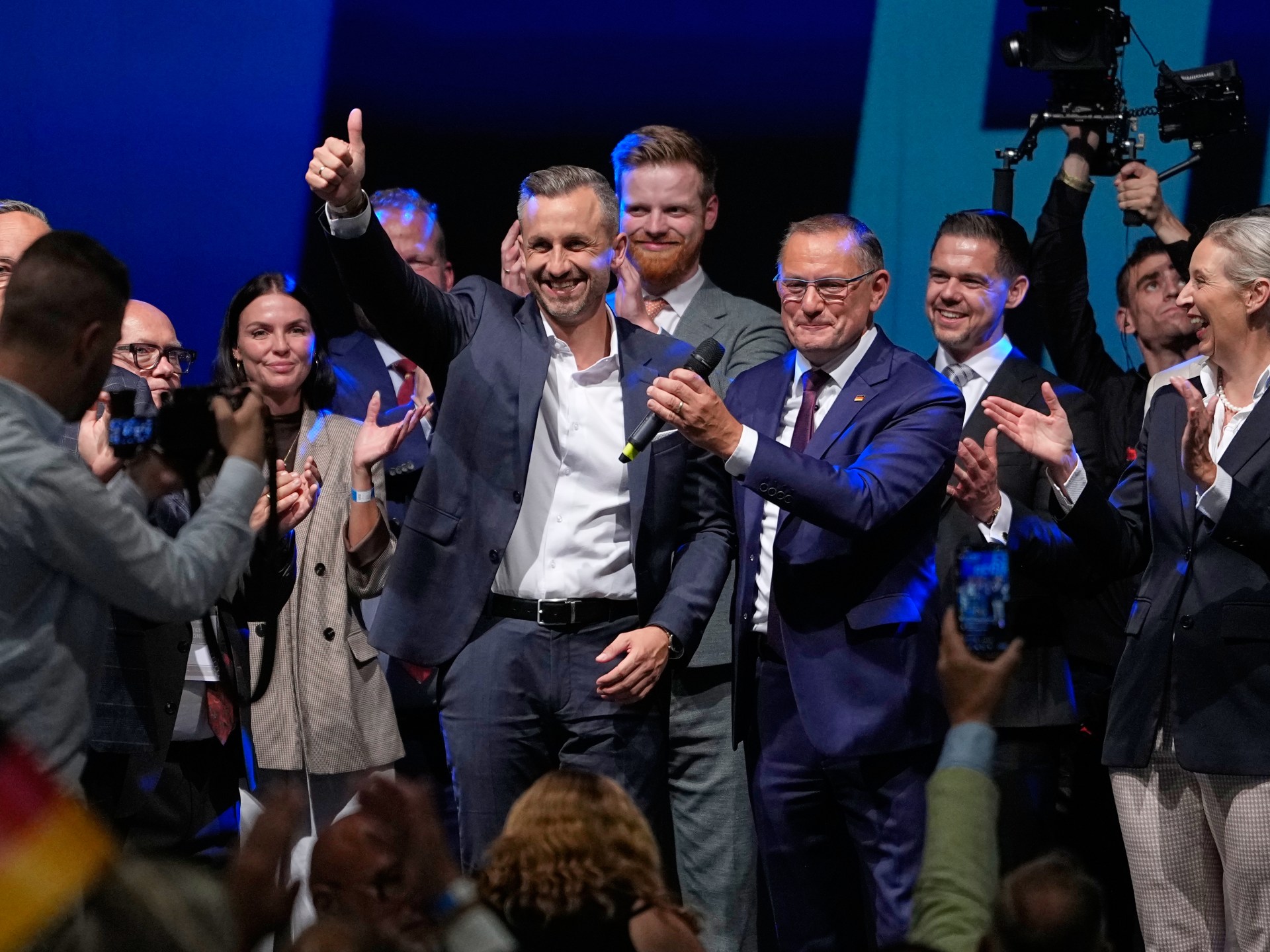 German leader Merz pledges fight against extremism after electoral setbacks