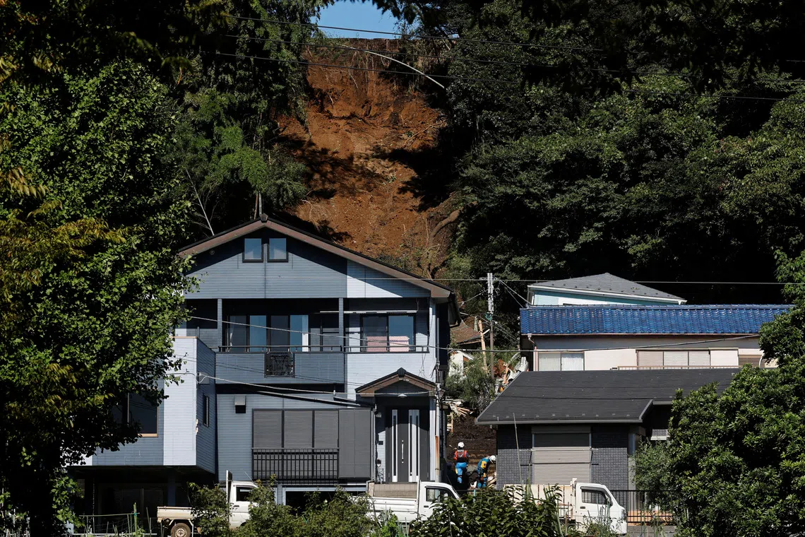 Japan typhoon kills two, displaces thousands as rains batter coast