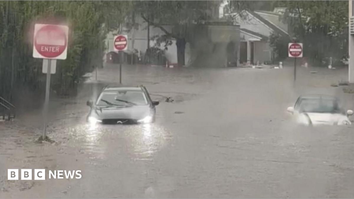 Flash floods sweep Northeast US, halt race and strand motorists