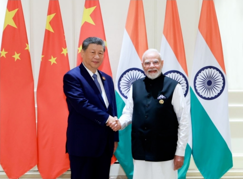 Xi and Modi pledge partnership approach over rivalry between China, India