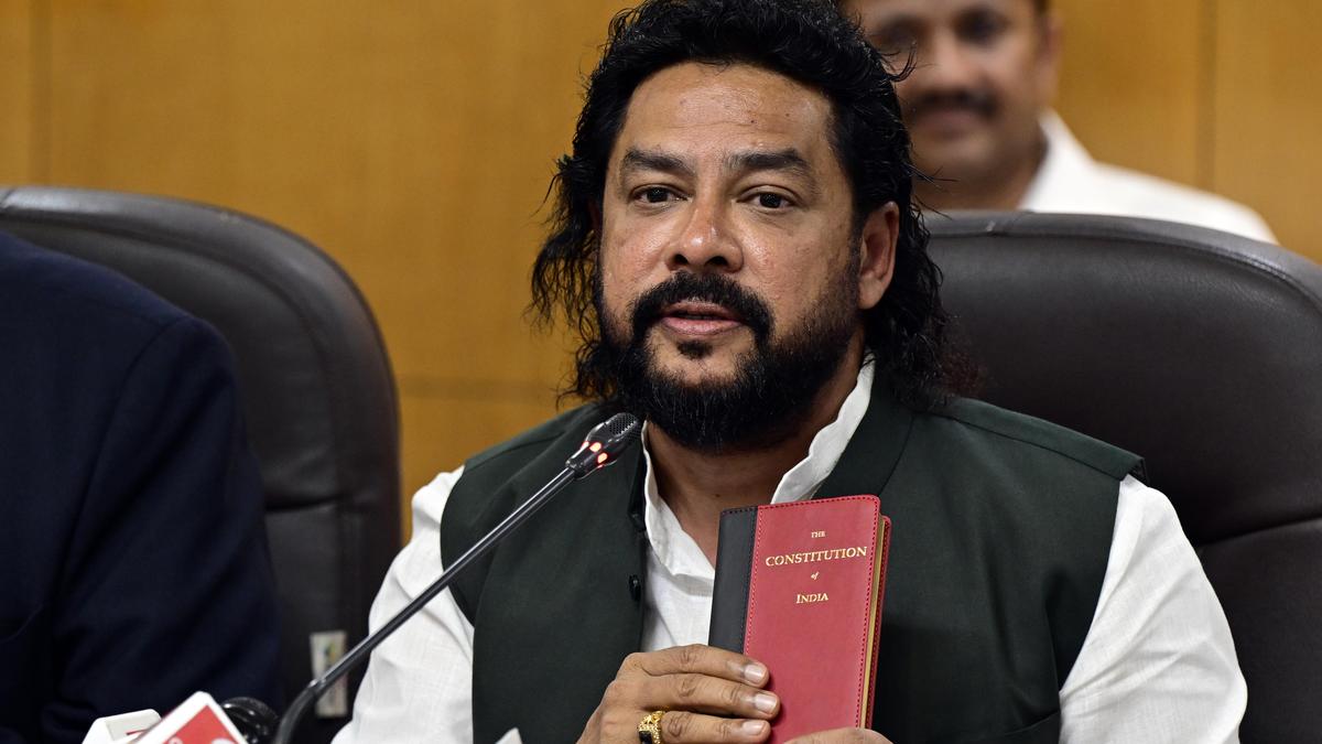 Karnataka govt stands firm on minister's appointment amid opposition uproar
