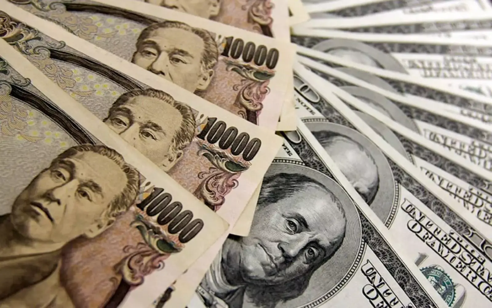 Yen weakens as BOJ rate decision looms; dollar gains on tech rally