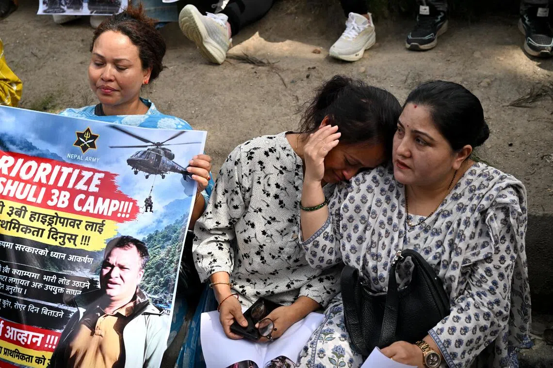 Nepal hydropower families urge faster pace in tunnel rescue effort
