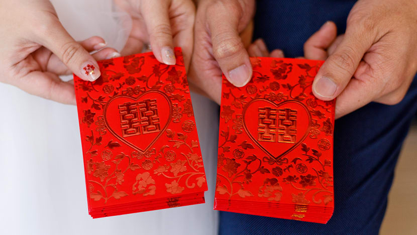 Man charged with theft of red packet box at Raffles Hotel wedding