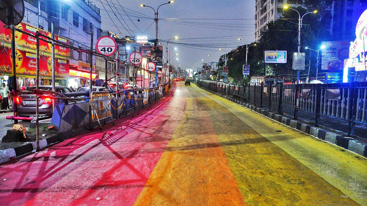 Kolkata streets transformed with traditional alpona art ahead of Durga Puja