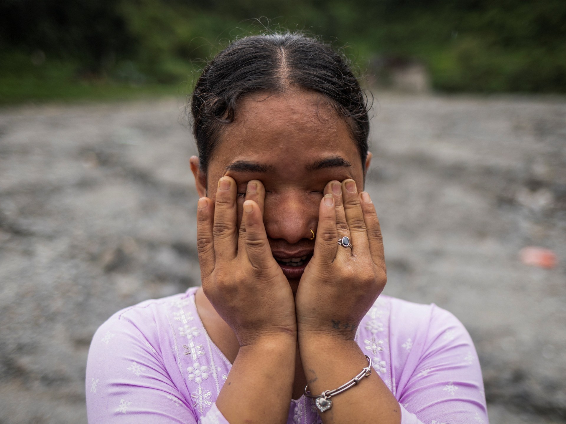 Survivors sift through debris as Nepal confronts devastating flood aftermath