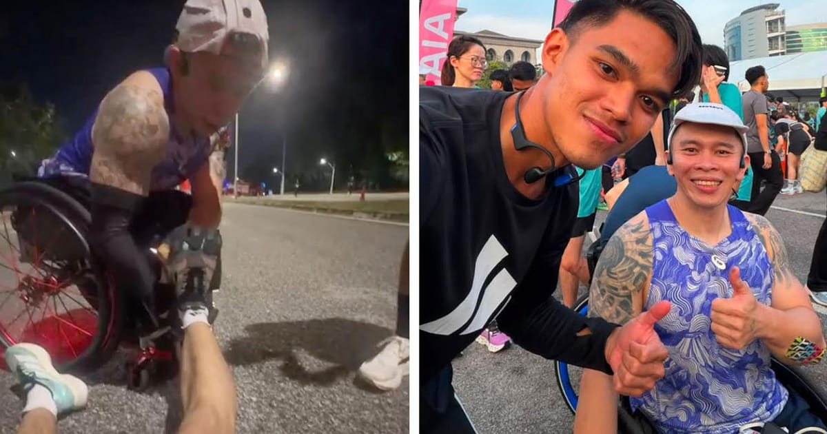 Wheelchair marathoner finds 'Malaysia in miniature' along race route
