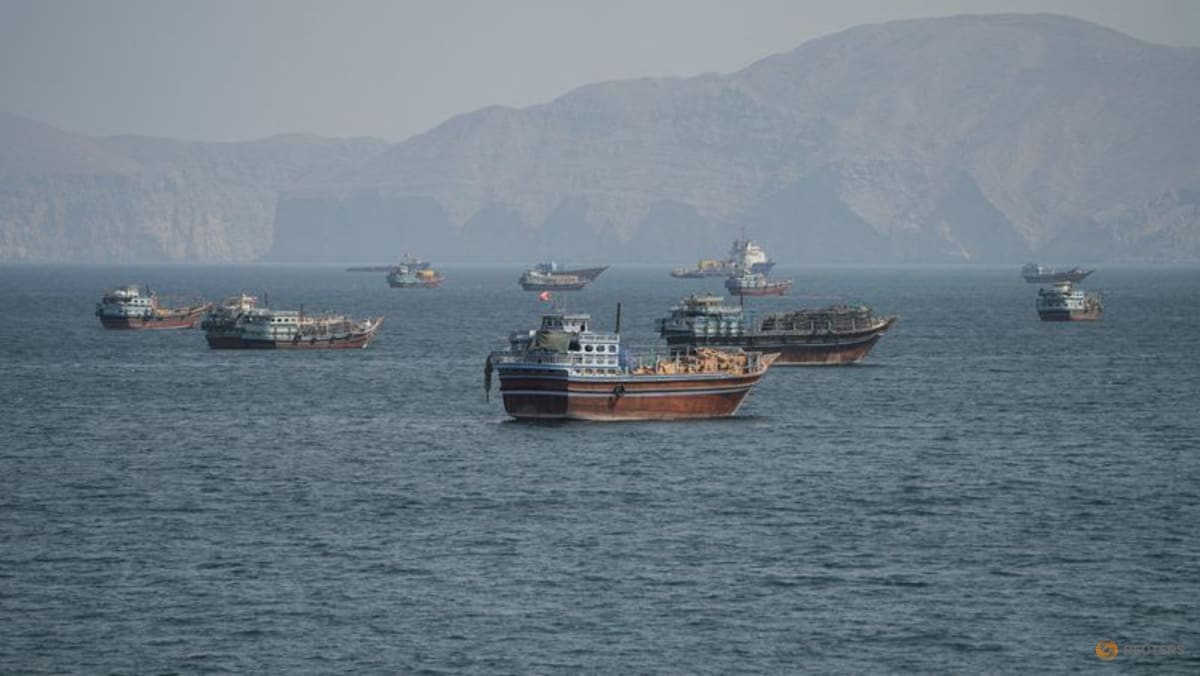 Singapore-registered vessels struck in Hormuz Strait; one vessel sinks