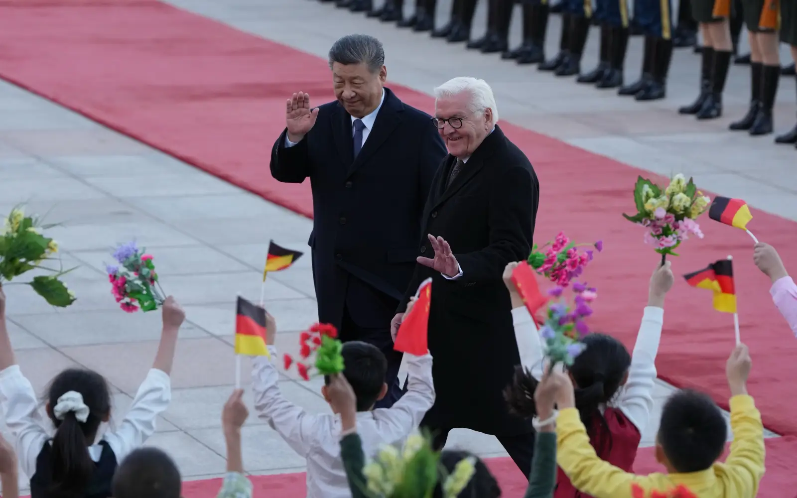 Xi urges new era of China-Germany ties as trade clouds gather