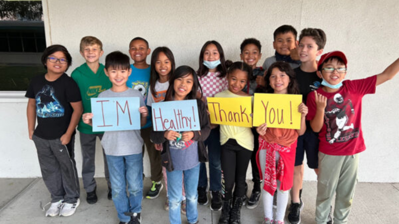 Olympic champion's foundation reaches 100,000 youth through swimming, wellness programs