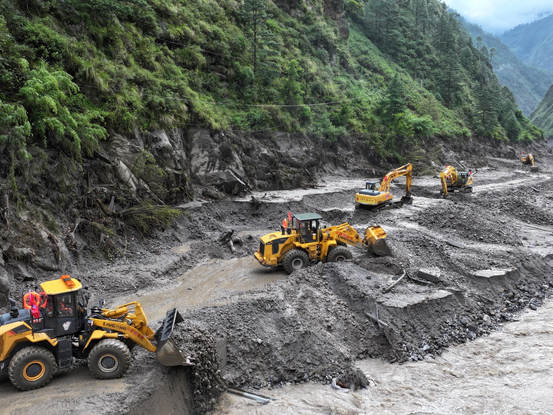 Nepal, China suspend rescue operations as glacial lake threatens thousands