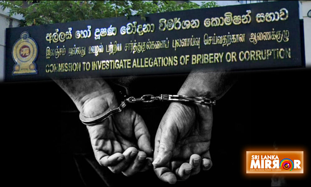 Ex-aide to former minister arrested in corruption probe