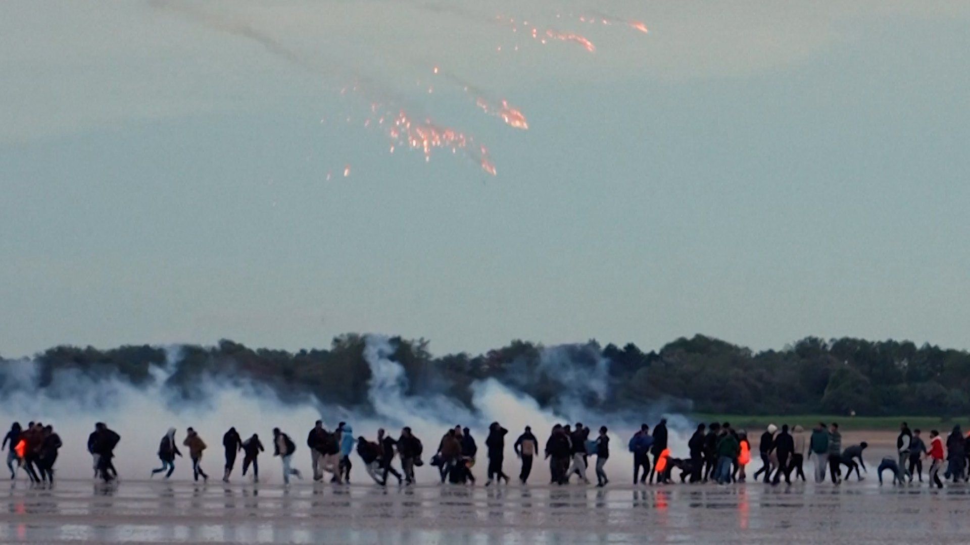 French authorities deploy tear gas against Channel crossing migrants