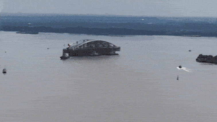 Massive steel arch completes landmark pedestrian bridge over Saigon River