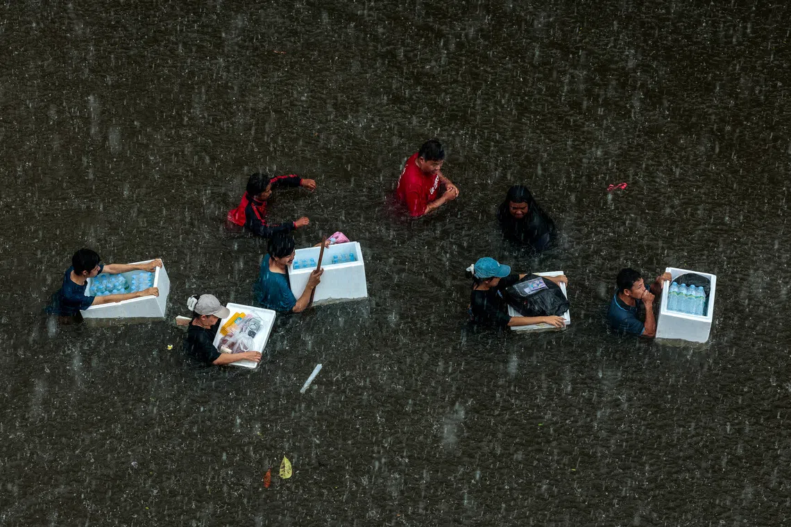 Bangkok floodwaters recede as residents survey damage from heavy downpour