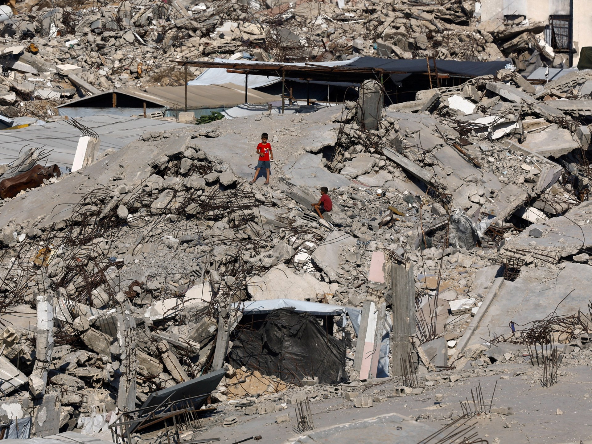 Residential building collapses in Gaza, multiple families feared trapped