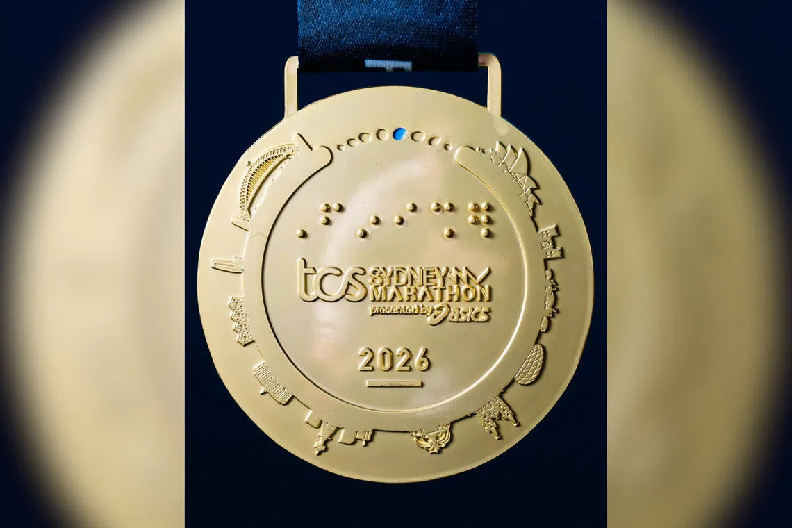 Sydney Marathon's Medal Features Munich Stadium in Skyline Error