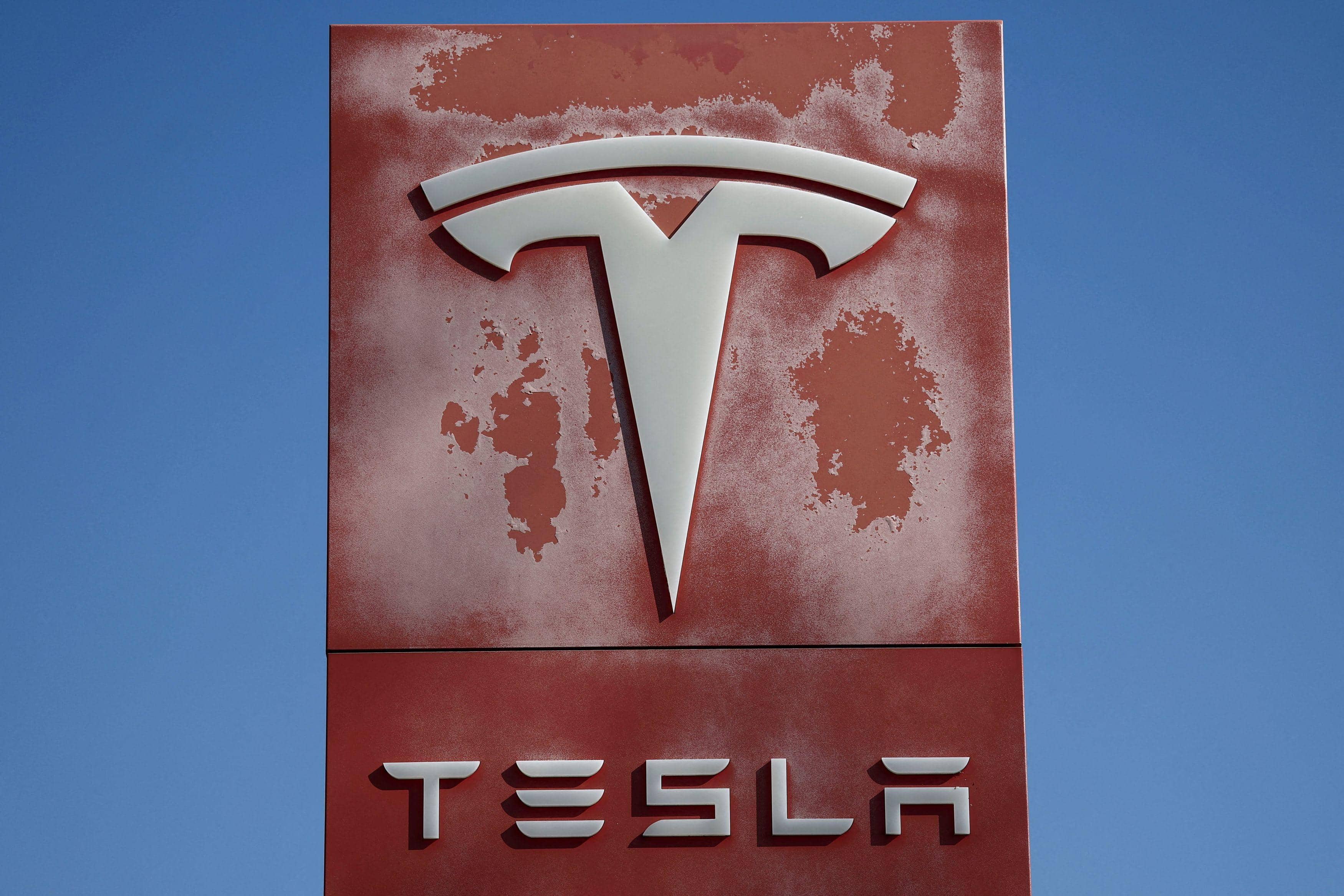 Tesla profit slides 44% but strong cash generation buoys investor confidence